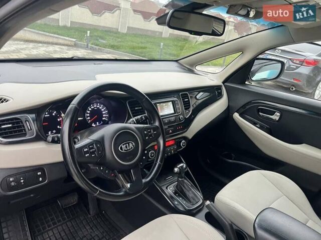 Черный Киа Каренс, объемом двигателя 1.69 л и пробегом 179 тыс. км за 10950 $, фото 179 на Automoto.ua