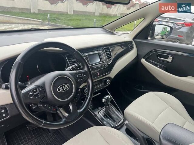 Черный Киа Каренс, объемом двигателя 1.69 л и пробегом 179 тыс. км за 10950 $, фото 117 на Automoto.ua