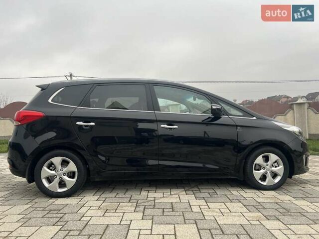 Черный Киа Каренс, объемом двигателя 1.69 л и пробегом 179 тыс. км за 10950 $, фото 56 на Automoto.ua