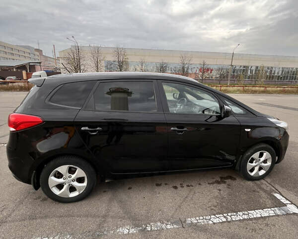 Чорний Кіа Каренс, об'ємом двигуна 1.69 л та пробігом 230 тис. км за 10500 $, фото 5 на Automoto.ua