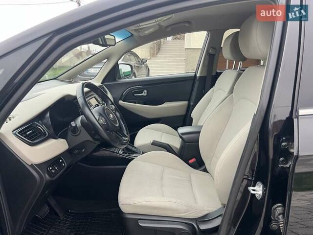Черный Киа Каренс, объемом двигателя 1.69 л и пробегом 179 тыс. км за 10950 $, фото 63 на Automoto.ua
