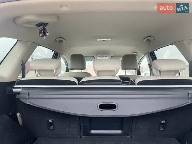 Черный Киа Каренс, объемом двигателя 1.69 л и пробегом 179 тыс. км за 10950 $, фото 131 на Automoto.ua