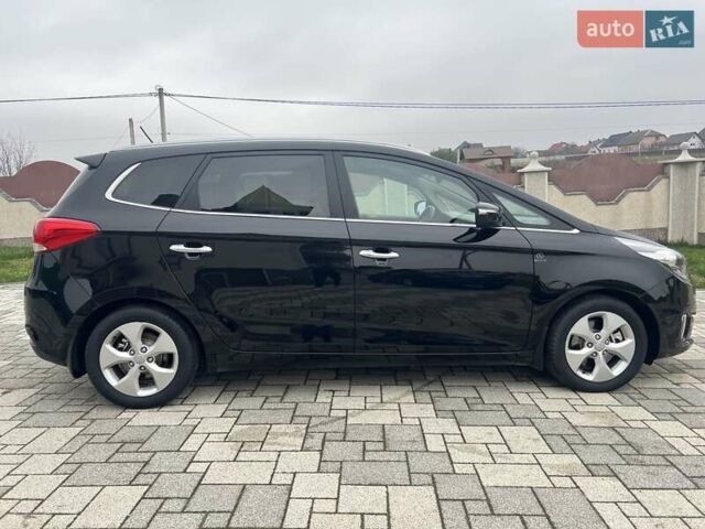 Черный Киа Каренс, объемом двигателя 1.69 л и пробегом 179 тыс. км за 10950 $, фото 32 на Automoto.ua