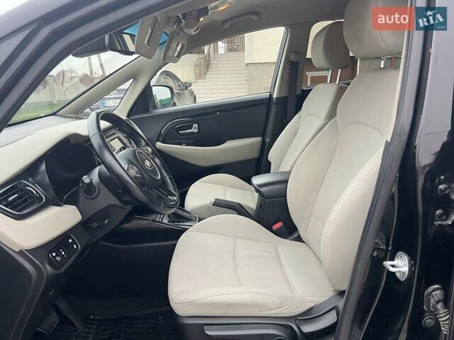 Черный Киа Каренс, объемом двигателя 1.69 л и пробегом 179 тыс. км за 10950 $, фото 68 на Automoto.ua