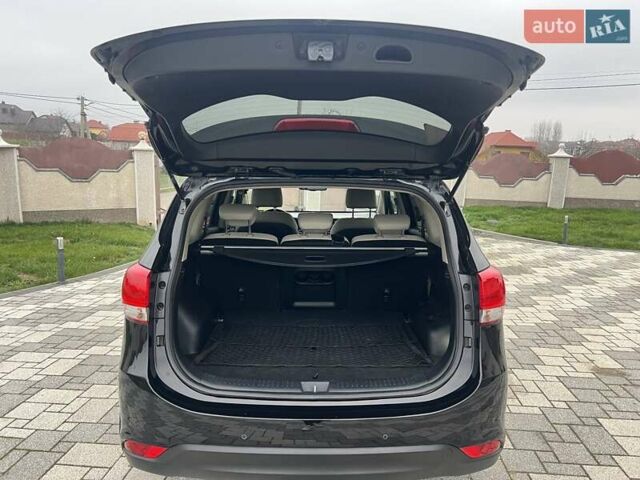 Черный Киа Каренс, объемом двигателя 1.69 л и пробегом 179 тыс. км за 10950 $, фото 108 на Automoto.ua