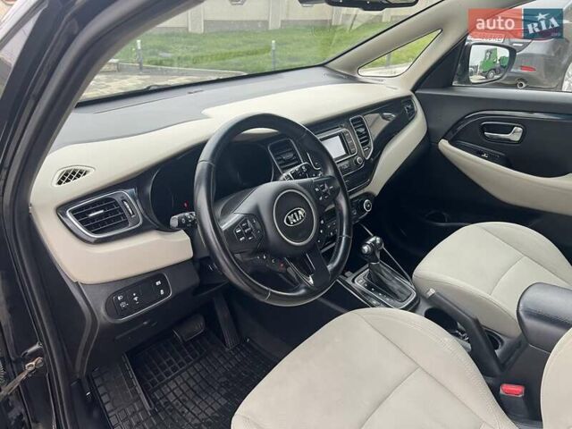 Черный Киа Каренс, объемом двигателя 1.69 л и пробегом 179 тыс. км за 10950 $, фото 121 на Automoto.ua