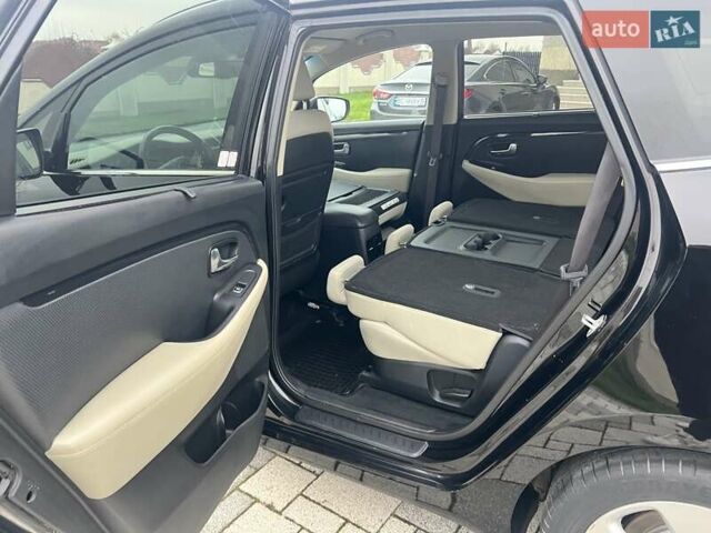Черный Киа Каренс, объемом двигателя 1.69 л и пробегом 179 тыс. км за 10950 $, фото 151 на Automoto.ua