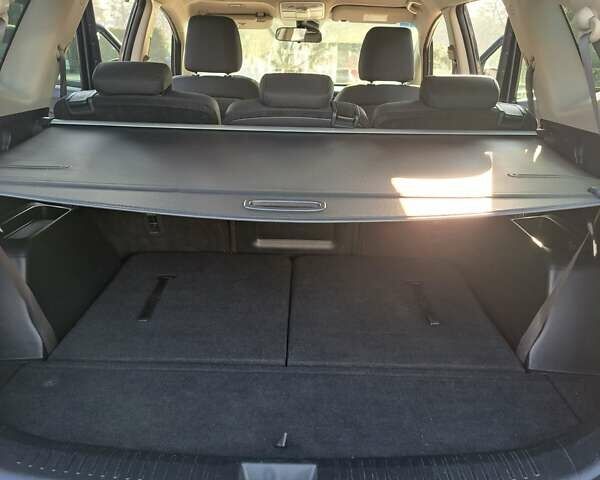 Черный Киа Каренс, объемом двигателя 1.69 л и пробегом 220 тыс. км за 12800 $, фото 2 на Automoto.ua