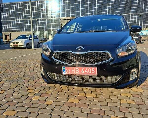 Черный Киа Каренс, объемом двигателя 1.69 л и пробегом 220 тыс. км за 12800 $, фото 1 на Automoto.ua