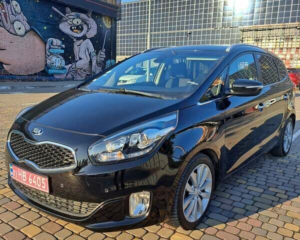 Черный Киа Каренс, объемом двигателя 1.69 л и пробегом 220 тыс. км за 12800 $, фото 12 на Automoto.ua
