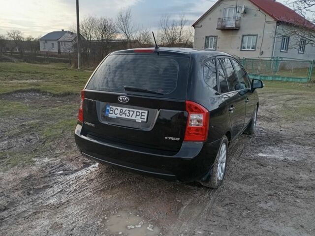 Черный Киа Каренс, объемом двигателя 2 л и пробегом 349 тыс. км за 6000 $, фото 2 на Automoto.ua