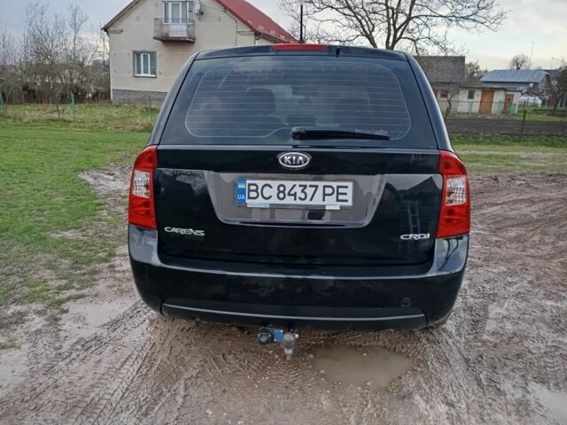 Черный Киа Каренс, объемом двигателя 2 л и пробегом 349 тыс. км за 6000 $, фото 7 на Automoto.ua