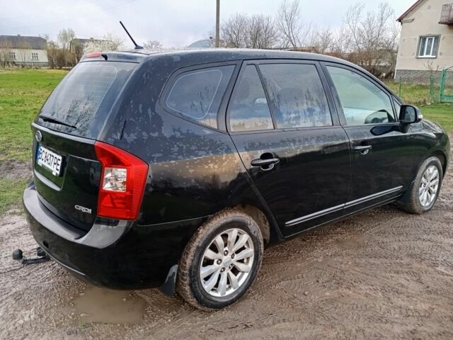 Черный Киа Каренс, объемом двигателя 2 л и пробегом 349 тыс. км за 6000 $, фото 10 на Automoto.ua