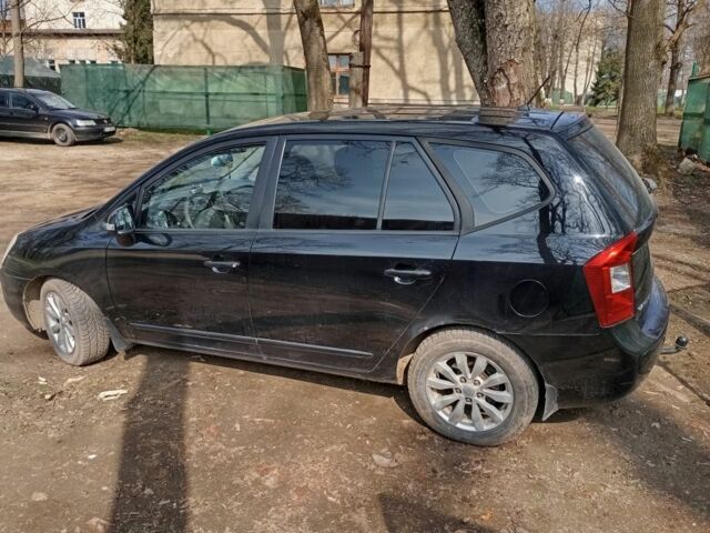 Черный Киа Каренс, объемом двигателя 2 л и пробегом 349 тыс. км за 6000 $, фото 6 на Automoto.ua