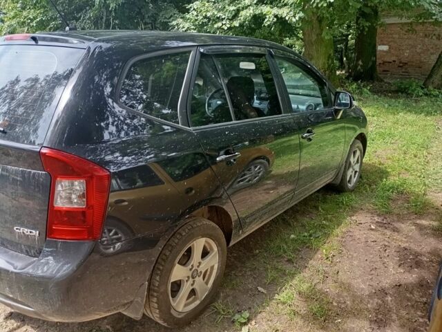 Черный Киа Каренс, объемом двигателя 2 л и пробегом 349 тыс. км за 6000 $, фото 12 на Automoto.ua