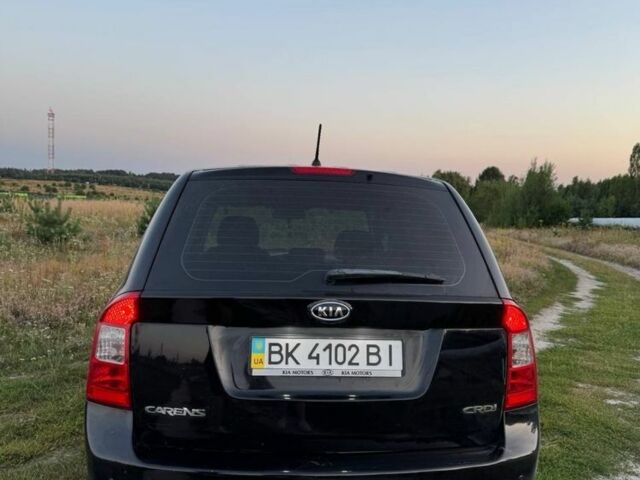 Черный Киа Каренс, объемом двигателя 2 л и пробегом 142 тыс. км за 8700 $, фото 3 на Automoto.ua