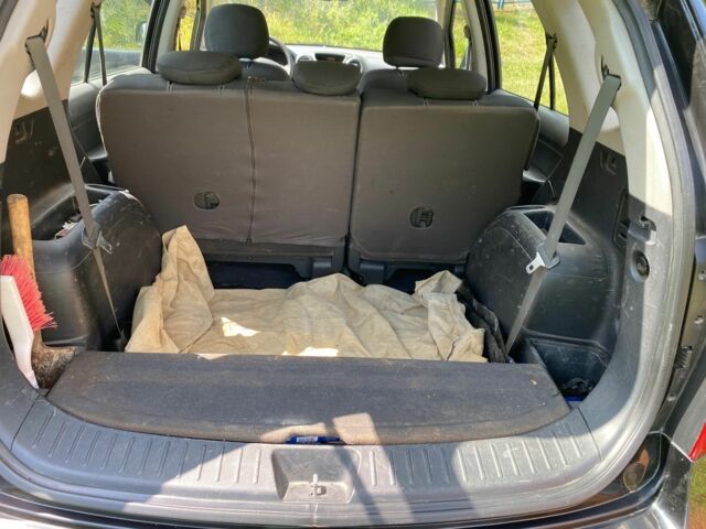 Черный Киа Каренс, объемом двигателя 2 л и пробегом 68 тыс. км за 9000 $, фото 5 на Automoto.ua