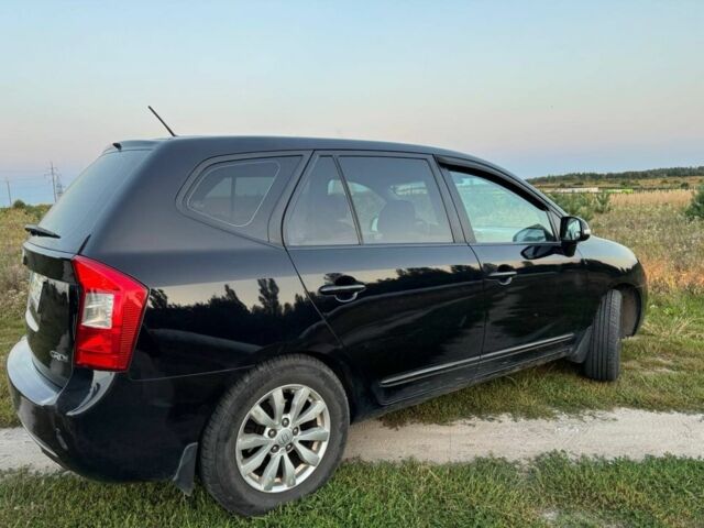 Черный Киа Каренс, объемом двигателя 2 л и пробегом 142 тыс. км за 8700 $, фото 2 на Automoto.ua