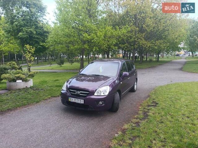 Фиолетовый Киа Каренс, объемом двигателя 2 л и пробегом 209 тыс. км за 7500 $, фото 18 на Automoto.ua
