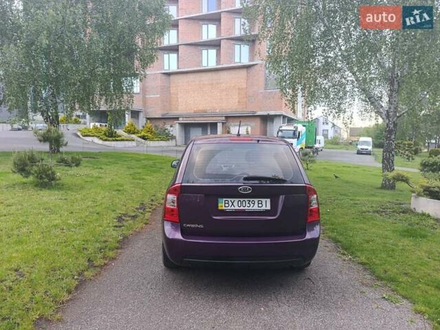 Фиолетовый Киа Каренс, объемом двигателя 2 л и пробегом 209 тыс. км за 7500 $, фото 19 на Automoto.ua
