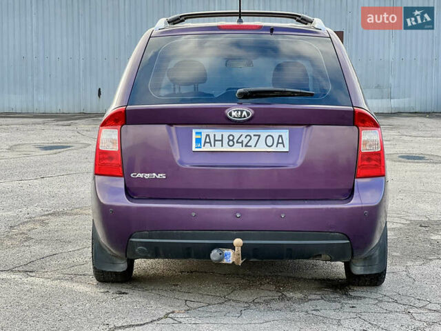 Фиолетовый Киа Каренс, объемом двигателя 2 л и пробегом 180 тыс. км за 6400 $, фото 6 на Automoto.ua