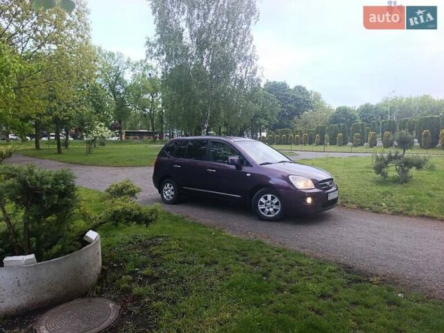 Фіолетовий Кіа Каренс, об'ємом двигуна 2 л та пробігом 209 тис. км за 6900 $, фото 11 на Automoto.ua