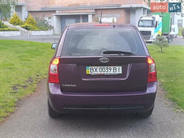 Фіолетовий Кіа Каренс, об'ємом двигуна 2 л та пробігом 209 тис. км за 6900 $, фото 3 на Automoto.ua