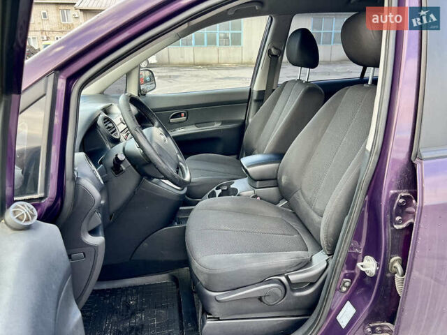 Фиолетовый Киа Каренс, объемом двигателя 2 л и пробегом 180 тыс. км за 6400 $, фото 11 на Automoto.ua