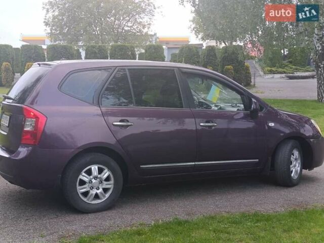 Фиолетовый Киа Каренс, объемом двигателя 2 л и пробегом 209 тыс. км за 7500 $, фото 16 на Automoto.ua