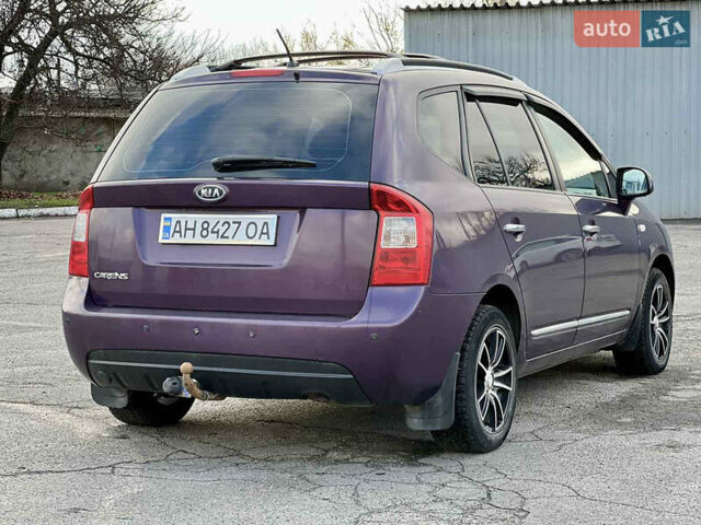 Фиолетовый Киа Каренс, объемом двигателя 2 л и пробегом 180 тыс. км за 6400 $, фото 3 на Automoto.ua
