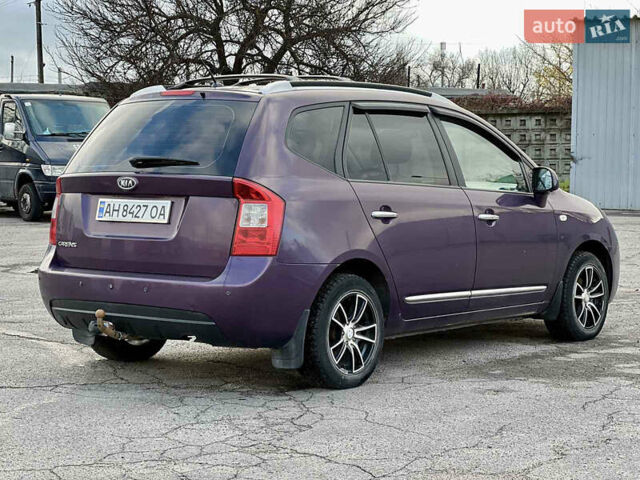 Фиолетовый Киа Каренс, объемом двигателя 2 л и пробегом 180 тыс. км за 6400 $, фото 2 на Automoto.ua