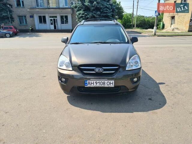 Коричневий Кіа Каренс, об'ємом двигуна 2 л та пробігом 183 тис. км за 7100 $, фото 1 на Automoto.ua