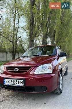 Красный Киа Каренс, объемом двигателя 2 л и пробегом 319 тыс. км за 4500 $, фото 1 на Automoto.ua