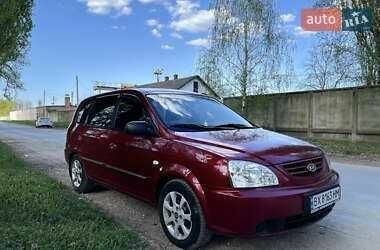 Красный Киа Каренс, объемом двигателя 2 л и пробегом 319 тыс. км за 4500 $, фото 4 на Automoto.ua