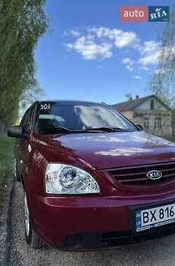 Красный Киа Каренс, объемом двигателя 2 л и пробегом 319 тыс. км за 4500 $, фото 3 на Automoto.ua