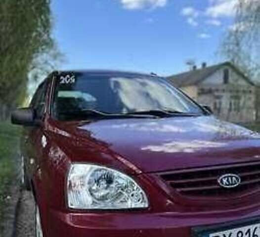 Красный Киа Каренс, объемом двигателя 2 л и пробегом 319 тыс. км за 4500 $, фото 2 на Automoto.ua