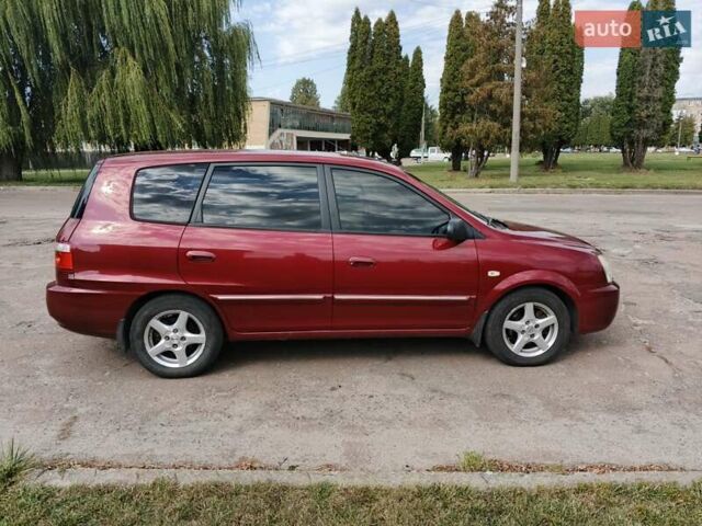 Красный Киа Каренс, объемом двигателя 2 л и пробегом 245 тыс. км за 4500 $, фото 7 на Automoto.ua