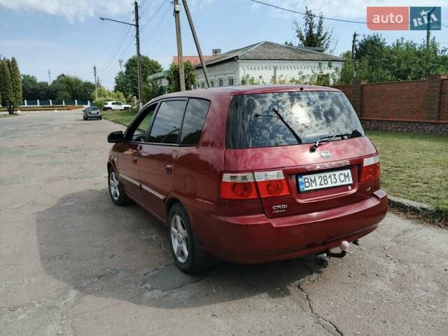 Красный Киа Каренс, объемом двигателя 2 л и пробегом 245 тыс. км за 4500 $, фото 6 на Automoto.ua