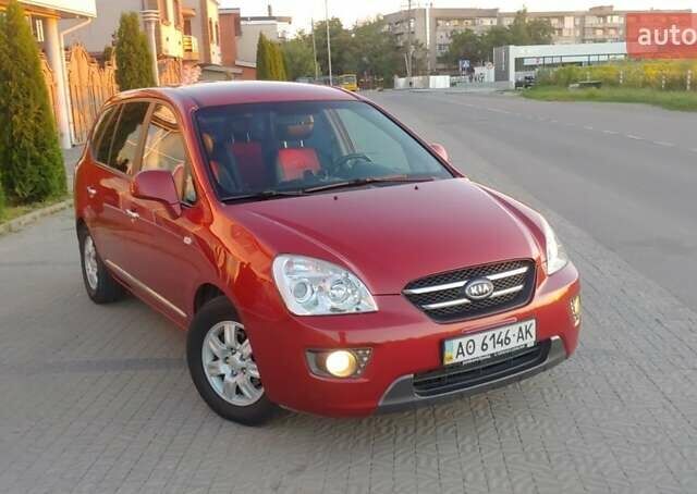 Червоний Кіа Каренс, об'ємом двигуна 2 л та пробігом 175 тис. км за 6000 $, фото 2 на Automoto.ua