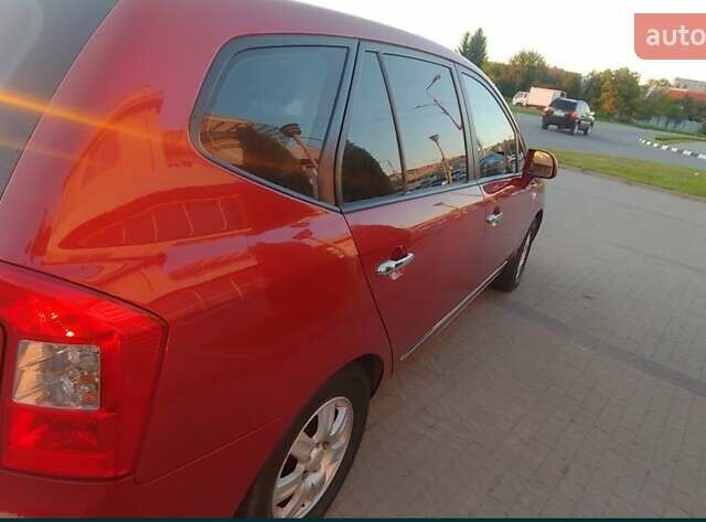 Червоний Кіа Каренс, об'ємом двигуна 2 л та пробігом 175 тис. км за 6000 $, фото 3 на Automoto.ua