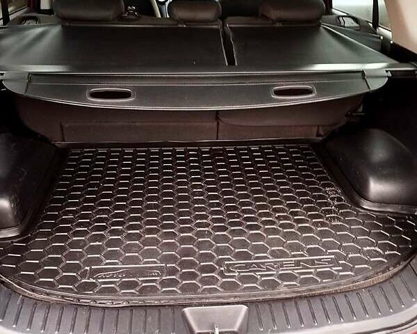 Червоний Кіа Каренс, об'ємом двигуна 2 л та пробігом 260 тис. км за 5800 $, фото 8 на Automoto.ua