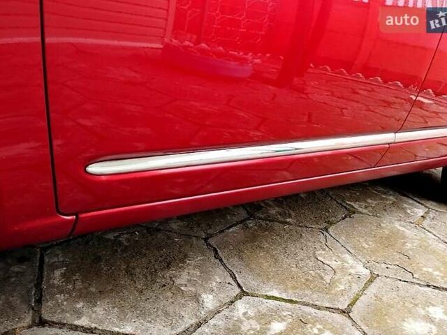 Червоний Кіа Каренс, об'ємом двигуна 2 л та пробігом 260 тис. км за 5800 $, фото 20 на Automoto.ua