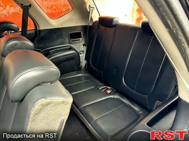 Кіа Каренс, об'ємом двигуна 2 л та пробігом 186 тис. км за 7500 $, фото 5 на Automoto.ua
