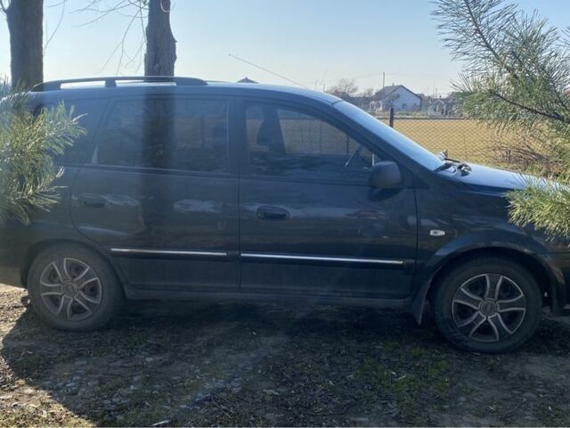 Серый Киа Каренс, объемом двигателя 1.6 л и пробегом 231 тыс. км за 3000 $, фото 2 на Automoto.ua