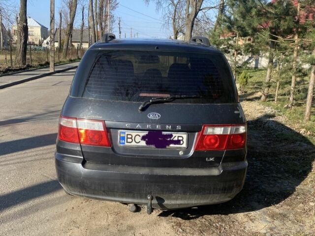 Серый Киа Каренс, объемом двигателя 1.6 л и пробегом 231 тыс. км за 3000 $, фото 1 на Automoto.ua