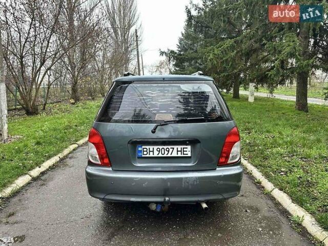 Серый Киа Каренс, объемом двигателя 1.8 л и пробегом 248 тыс. км за 1800 $, фото 4 на Automoto.ua