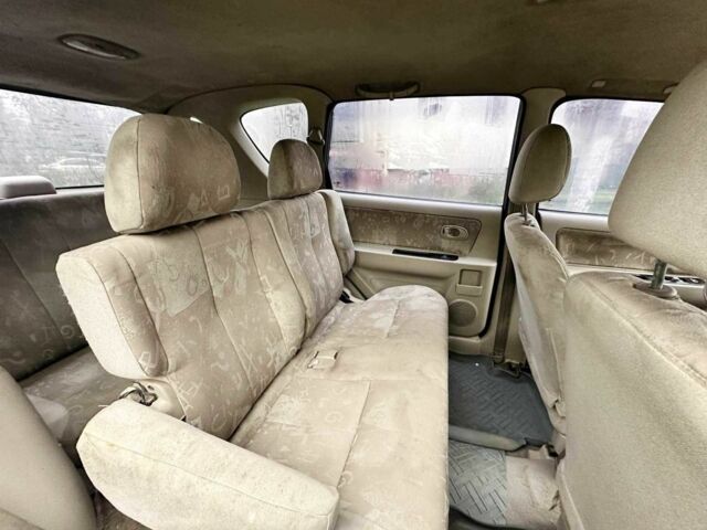 Серый Киа Каренс, объемом двигателя 1.8 л и пробегом 248 тыс. км за 1800 $, фото 6 на Automoto.ua