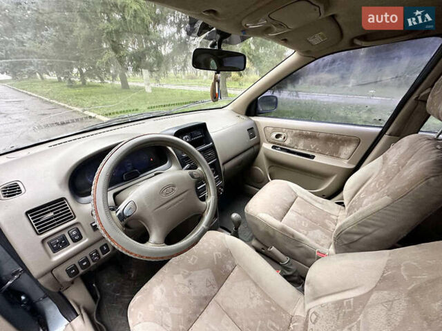 Серый Киа Каренс, объемом двигателя 1.8 л и пробегом 248 тыс. км за 1800 $, фото 9 на Automoto.ua