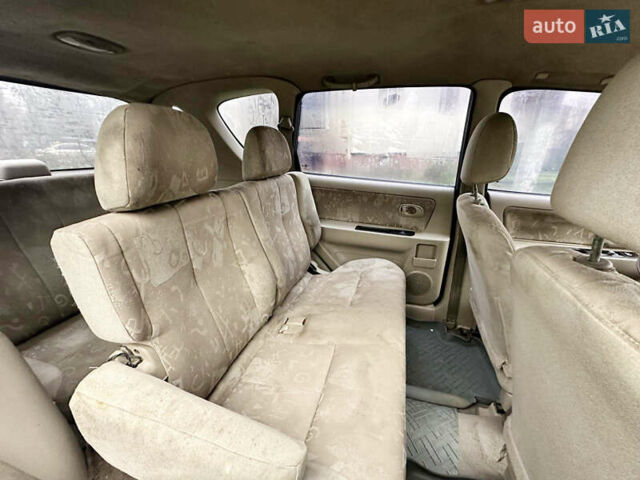 Серый Киа Каренс, объемом двигателя 1.8 л и пробегом 248 тыс. км за 1800 $, фото 6 на Automoto.ua