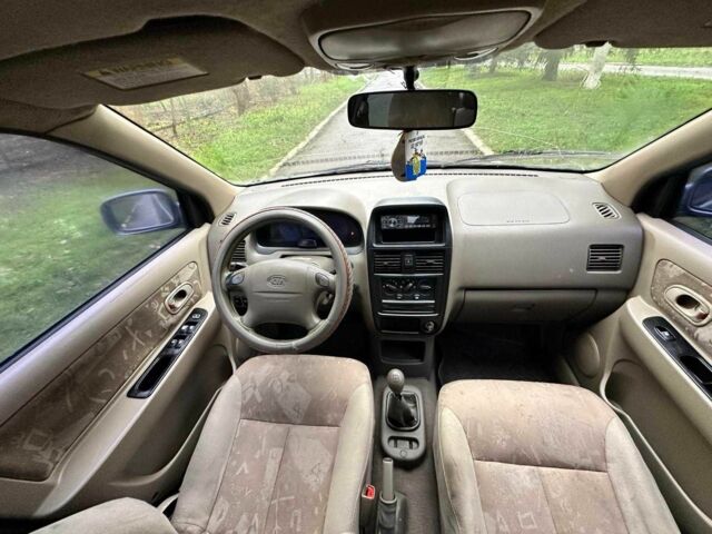 Серый Киа Каренс, объемом двигателя 1.8 л и пробегом 248 тыс. км за 1800 $, фото 8 на Automoto.ua